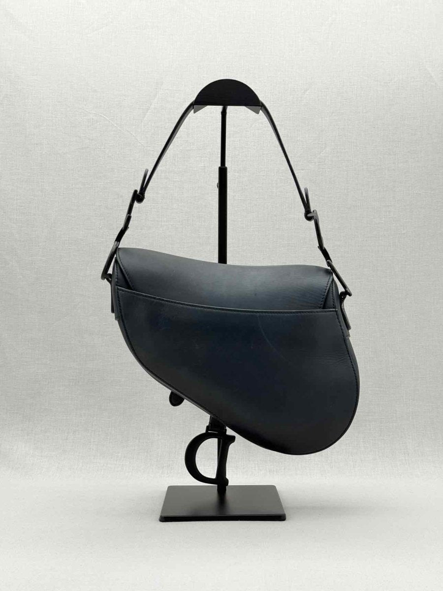 Pre - loved CHRISTIAN DIOR Ultra Matte Black Saddle Bag at Reems Closet
