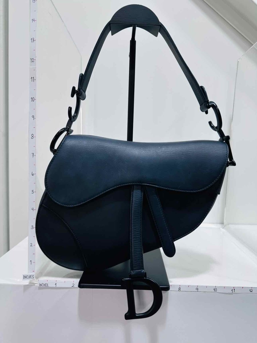 Pre - loved CHRISTIAN DIOR Ultra Matte Black Saddle Bag at Reems Closet