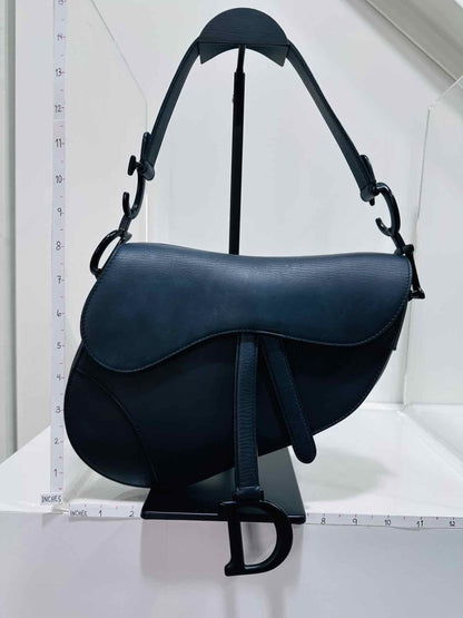 Pre - loved CHRISTIAN DIOR Ultra Matte Black Saddle Bag at Reems Closet
