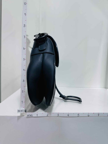 Pre - loved CHRISTIAN DIOR Ultra Matte Black Saddle Bag at Reems Closet