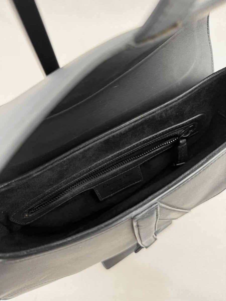 Pre - loved CHRISTIAN DIOR Ultra Matte Black Saddle Bag at Reems Closet
