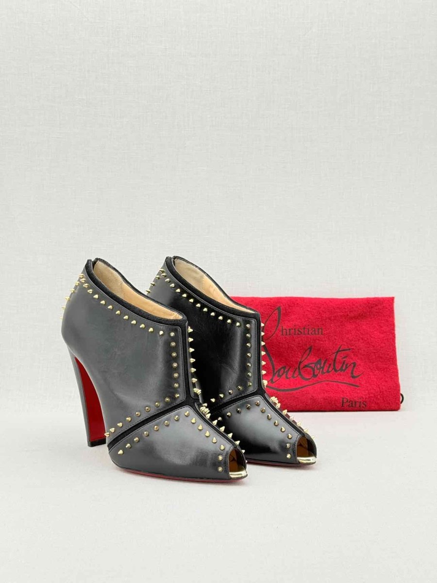 Pre - loved CHRISTIAN LOUBOUTIN Black & Gold Size EU 38 Ankle Boots at Reems Closet