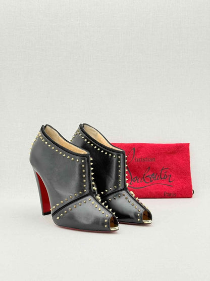 Pre - loved CHRISTIAN LOUBOUTIN Black & Gold Size EU 38 Ankle Boots at Reems Closet