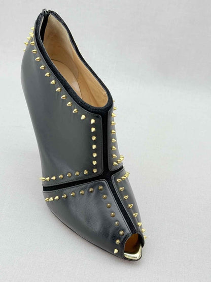Pre - loved CHRISTIAN LOUBOUTIN Black & Gold Size EU 38 Ankle Boots at Reems Closet