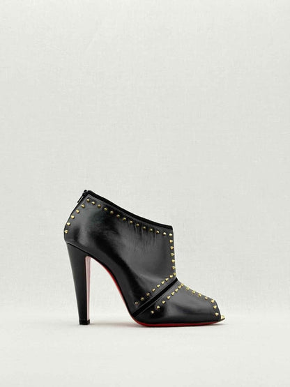 Pre - loved CHRISTIAN LOUBOUTIN Black & Gold Size EU 38 Ankle Boots at Reems Closet