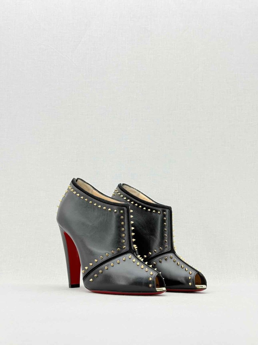 Pre - loved CHRISTIAN LOUBOUTIN Black & Gold Size EU 38 Ankle Boots at Reems Closet