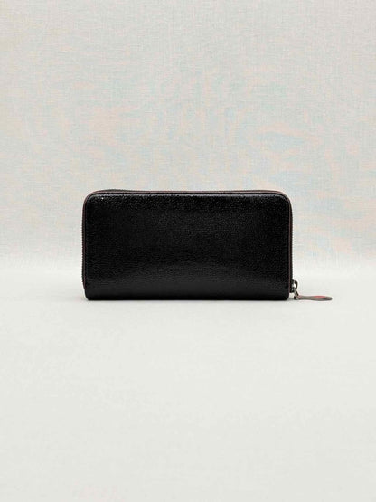 Pre-loved CHRISTIAN LOUBOUTIN Black Pebbled Continental Wallet at Reems Closet