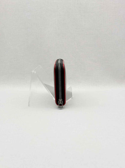 Pre-loved CHRISTIAN LOUBOUTIN Black Pebbled Continental Wallet at Reems Closet
