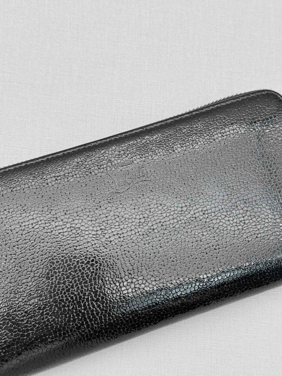 Pre-loved CHRISTIAN LOUBOUTIN Black Pebbled Continental Wallet at Reems Closet