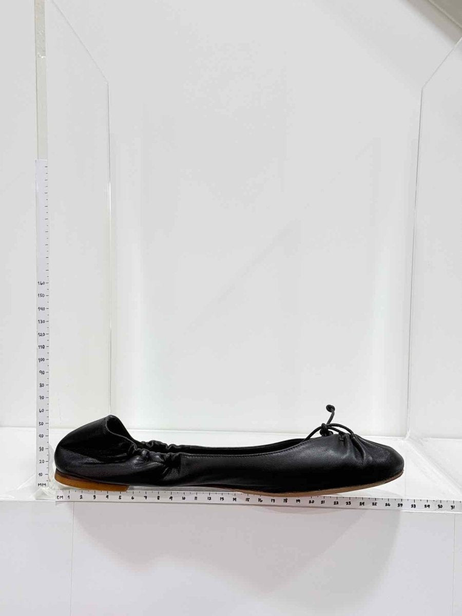 Pre-loved CHRISTIAN LOUBOUTIN Black Size EU 40.5 Ballet Flats at Reems Closet