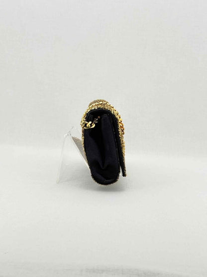 Pre-loved CHRISTIAN LOUBOUTIN Catalina Gold & Brown Clutch at Reems Closet