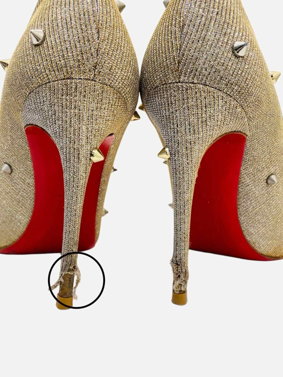 Pre - loved CHRISTIAN LOUBOUTIN Spikes Gold Pumps at Reems Closet