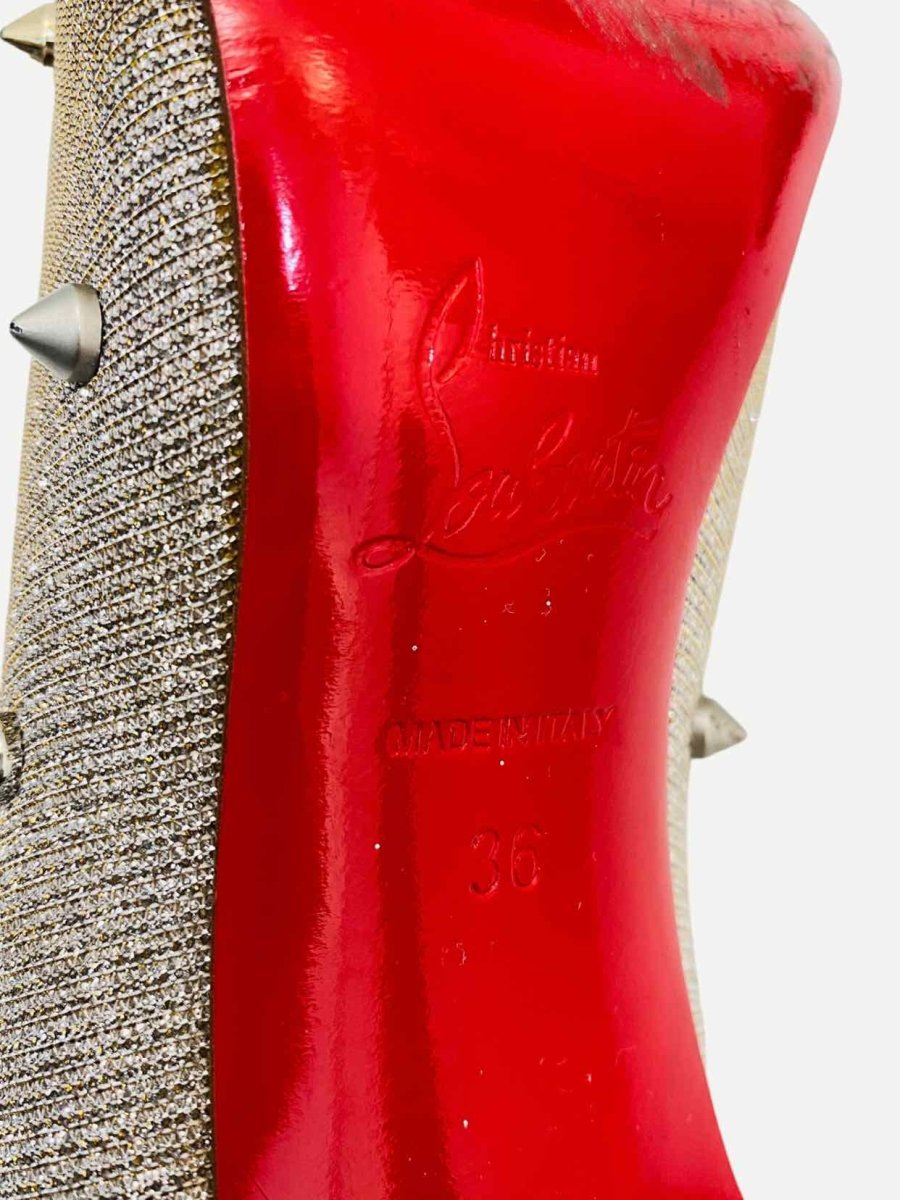 Pre - loved CHRISTIAN LOUBOUTIN Spikes Gold Pumps at Reems Closet