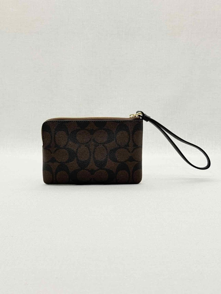 Pre - loved COACH Corner Zip Brown Signature Wristlet at Reems Closet