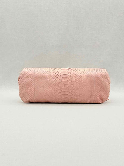 Pre-loved DEVI KROELL Pastel Pink Clutch at Reems Closet