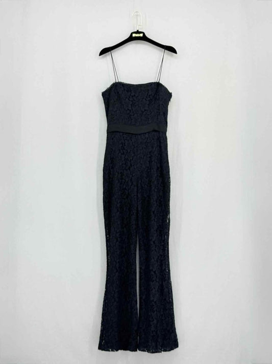 Pre - loved DIANE VON FURSTENBERG Black Size XSmall Jumpsuit at Reems Closet