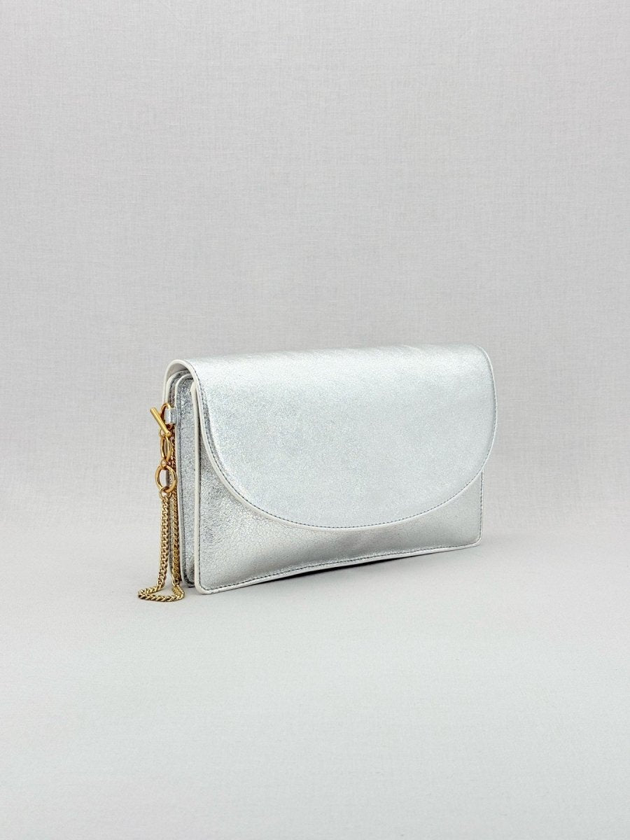 Pre - loved DIANE VON FURSTENBERG Saddle Silver Clutch at Reems Closet