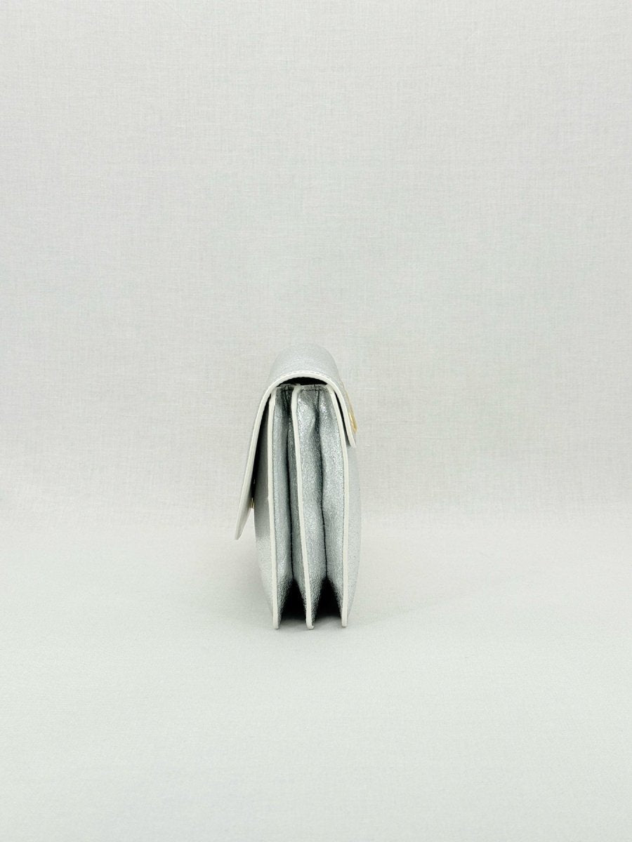 Pre - loved DIANE VON FURSTENBERG Saddle Silver Clutch at Reems Closet