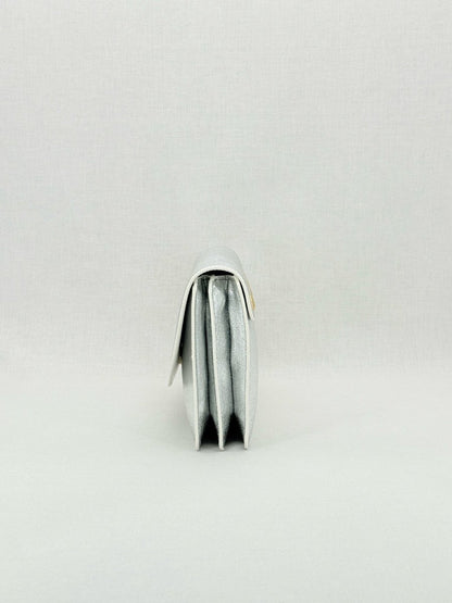 Pre - loved DIANE VON FURSTENBERG Saddle Silver Clutch at Reems Closet