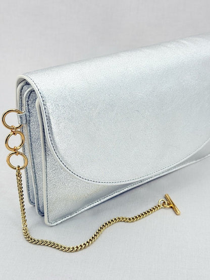 Pre - loved DIANE VON FURSTENBERG Saddle Silver Clutch at Reems Closet