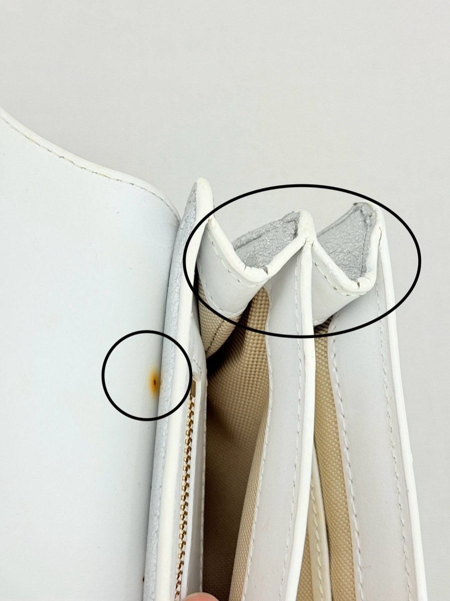 Pre - loved DIANE VON FURSTENBERG Saddle Silver Clutch at Reems Closet