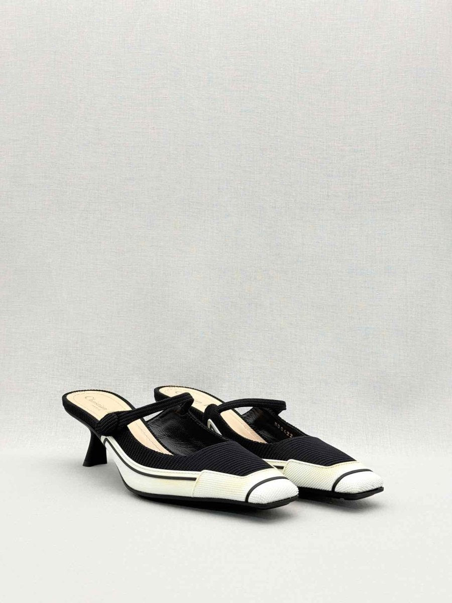 Pre-loved DIOR D-Motion Black & White Size EU 41 Mules at Reems Closet