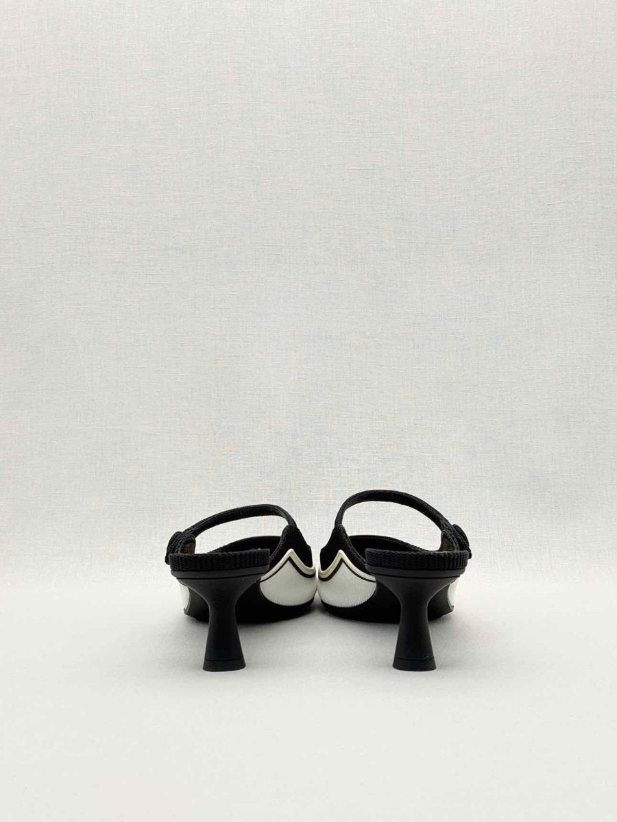 Pre-loved DIOR D-Motion Black & White Size EU 41 Mules at Reems Closet
