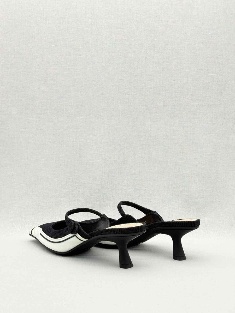 Pre-loved DIOR D-Motion Black & White Size EU 41 Mules at Reems Closet