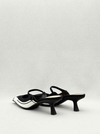 Pre-loved DIOR D-Motion Black & White Size EU 41 Mules at Reems Closet