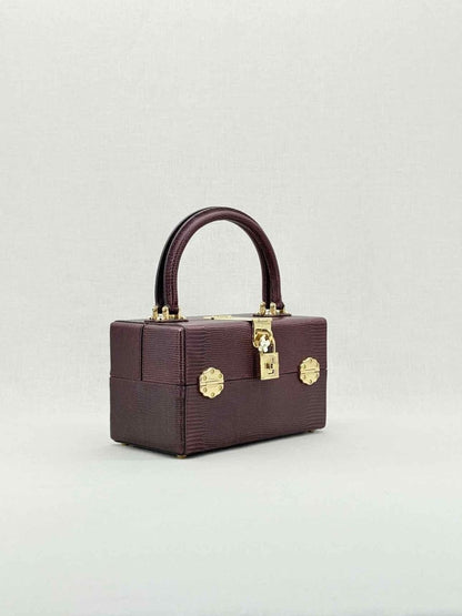 Pre - loved DOLCE & GABBANA Box Burgundy Iguana Embossed Top Handle at Reems Closet