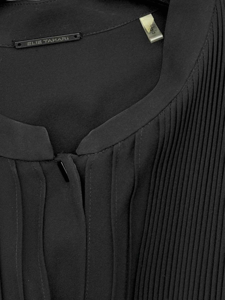 Pre-loved ELIE TAHARI Black Size Medium Knee Length Dress at Reems Closet