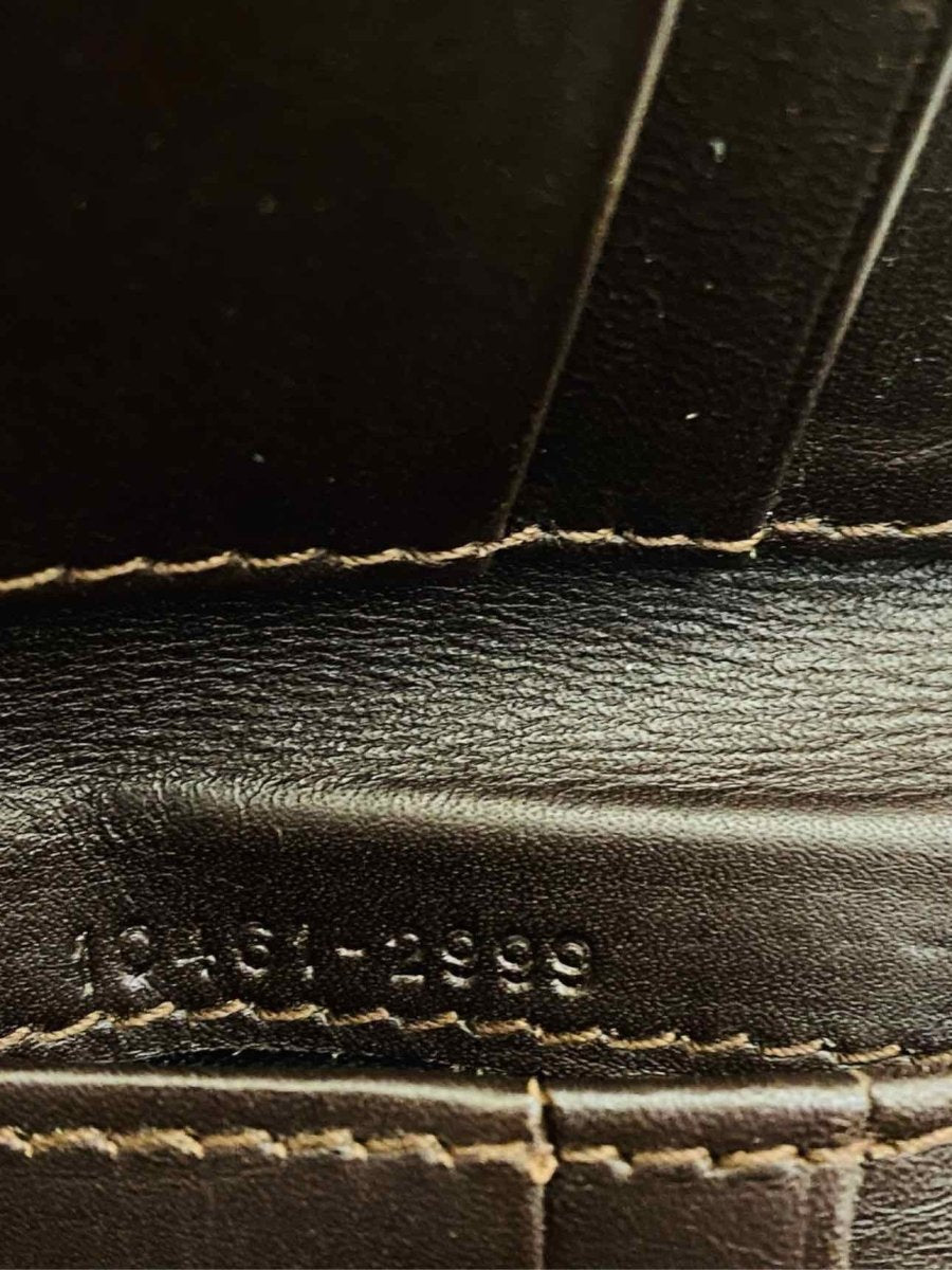 Pre-loved ETRO Bi-Fold Brown Wallet from Reems Closet