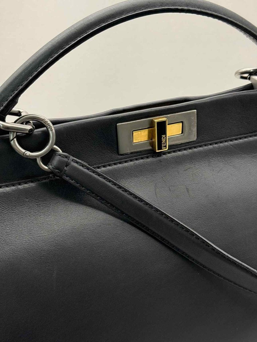 Pre-loved FENDI Peasant Black Top Handle at Reems Closet