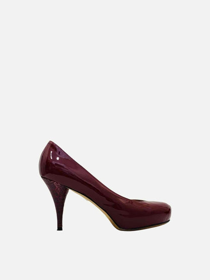 Pre-loved FENDI Ruby Red FF Motif Pumps from Reems Closet