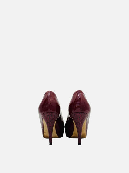 Pre-loved FENDI Ruby Red FF Motif Pumps from Reems Closet