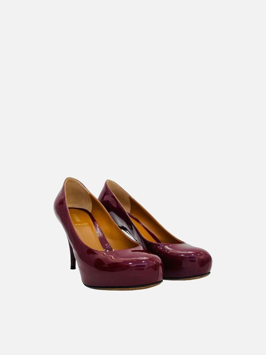 Pre-loved FENDI Ruby Red FF Motif Pumps from Reems Closet