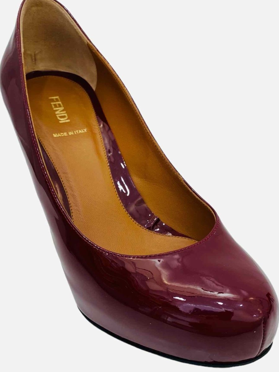 Pre-loved FENDI Ruby Red FF Motif Pumps from Reems Closet