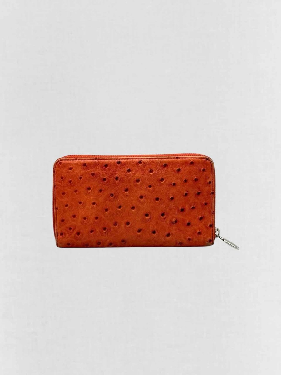 Pre - loved FURLA Orange Ostrich Continental Wallet at Reems Closet