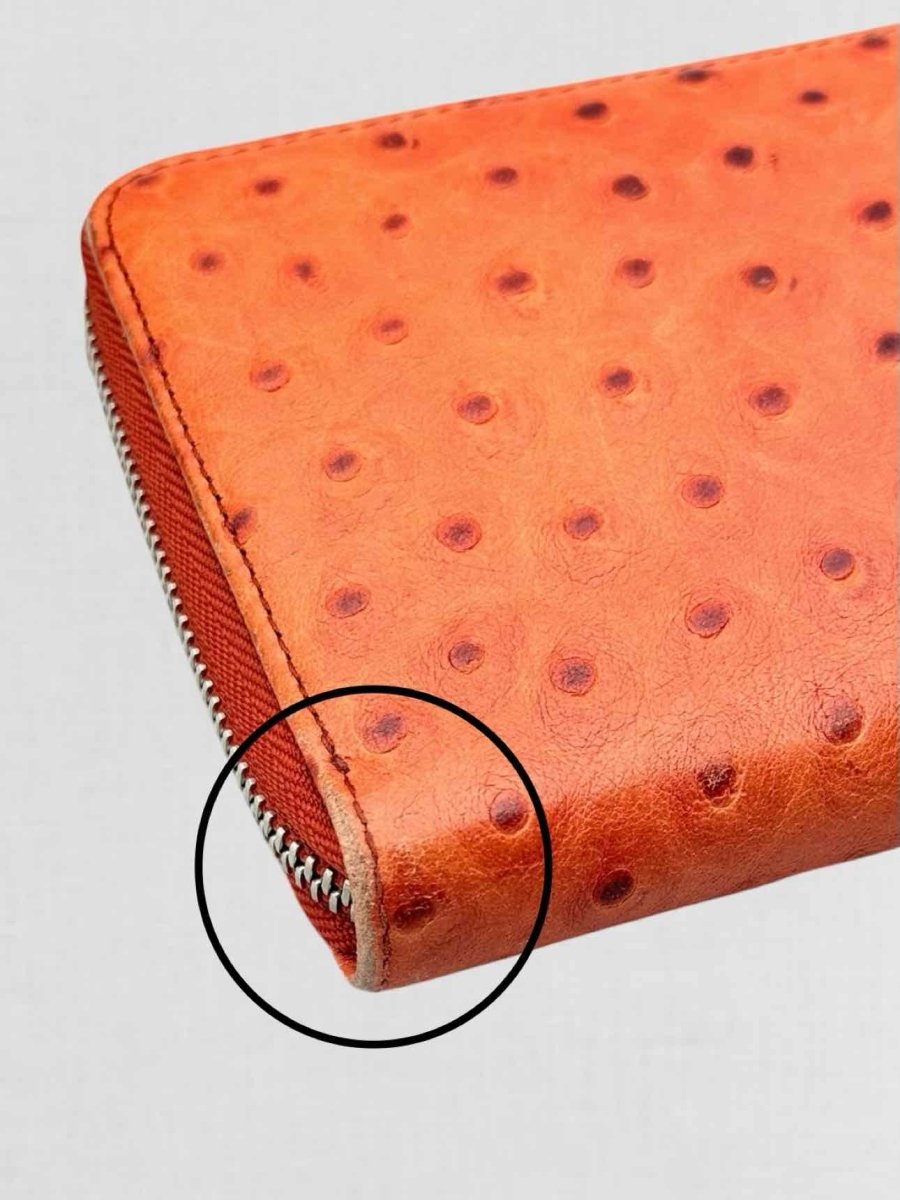 Pre - loved FURLA Orange Ostrich Continental Wallet at Reems Closet