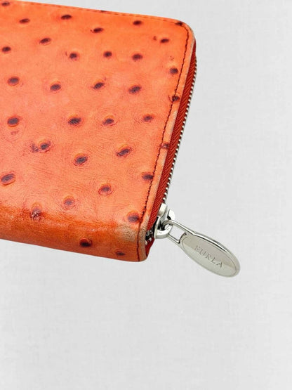 Pre - loved FURLA Orange Ostrich Continental Wallet at Reems Closet