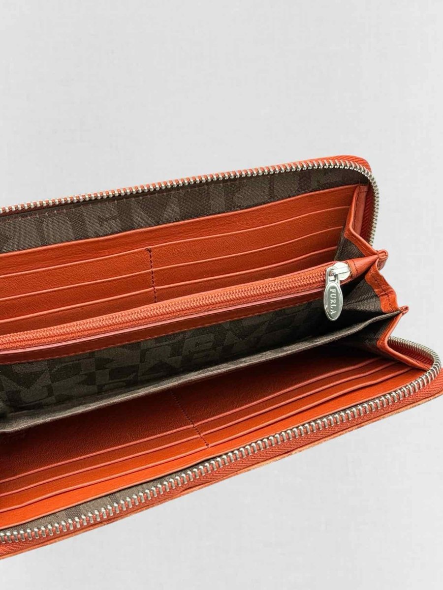 Pre - loved FURLA Orange Ostrich Continental Wallet at Reems Closet