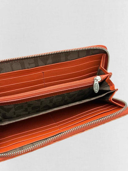 Pre - loved FURLA Orange Ostrich Continental Wallet at Reems Closet