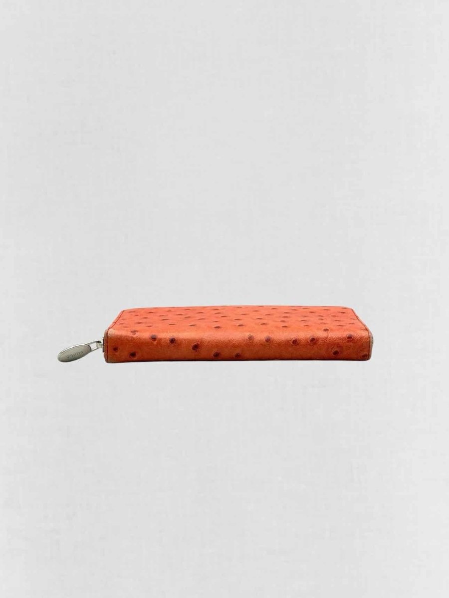 Pre - loved FURLA Orange Ostrich Continental Wallet at Reems Closet