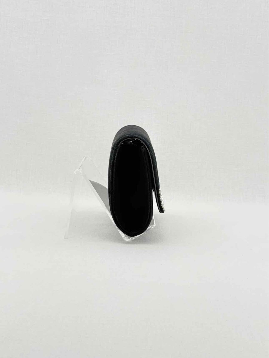 Pre - loved GIUSEPPE ZANOTTI Black Clutch at Reems Closet