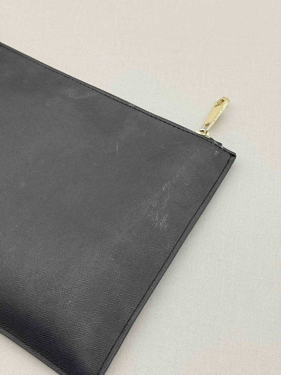 Pre-loved GIVENCHY Bambi Black Pouch at Reems Closet