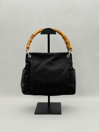 Pre-loved GUCCI Bamboo Black Top Handle at Reems Closet