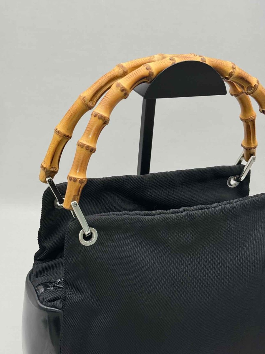 Pre-loved GUCCI Bamboo Black Top Handle at Reems Closet
