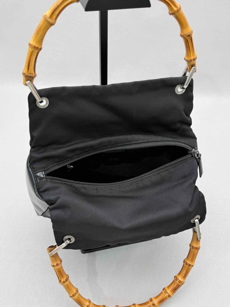 Pre-loved GUCCI Bamboo Black Top Handle at Reems Closet