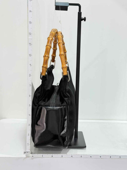 Pre-loved GUCCI Bamboo Black Top Handle at Reems Closet