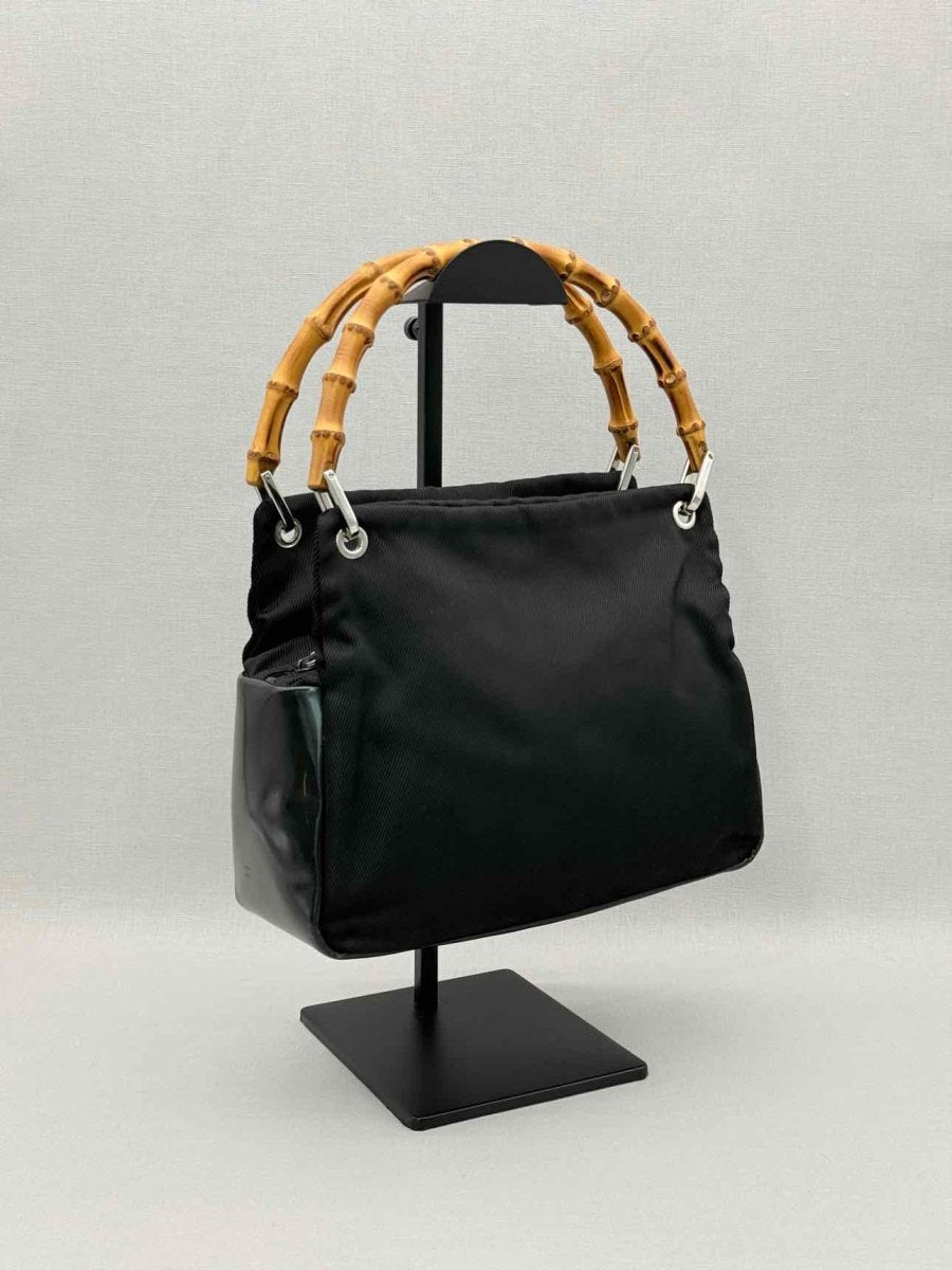 Pre-loved GUCCI Bamboo Black Top Handle at Reems Closet